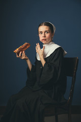 Medieval young woman as a nun