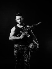 Obraz premium a man with a machinegun