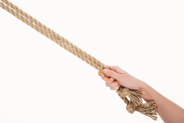 cropped view of woman holding jute ropes isolated on white