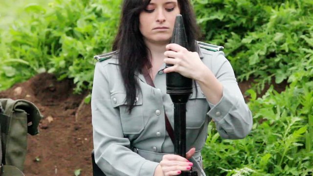 Cold War - Female soldier loads rocket launcher