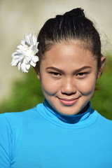 Portrait Of An Asian Person With Flower