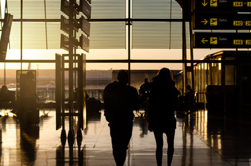 People walking inside a airport terminal