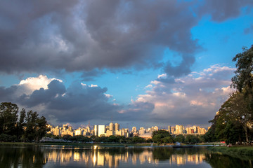 Fototapeta na wymiar Skyline of Sao Paulo city and reflex in lake