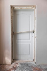 new house door. white door with polyurethane foam.