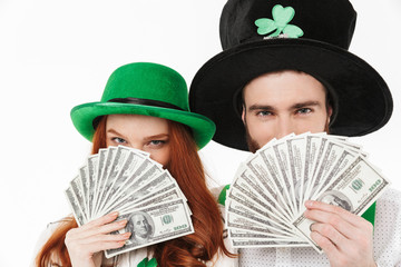 Happy young couple wearing costumes, celebrating