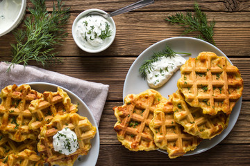 cheese waffles with corn flour, herbs and sauce