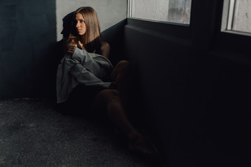 Obraz premium Beautiful Caucasian Woman Sit on Floor Medium Shot
