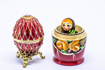 Matryoshka family. Matrioska art Russian doll and Russian souvenir, egg casket copy of Faberge on a...