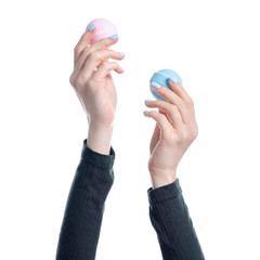 Blue pink bomb for bath in hand on white background isolation