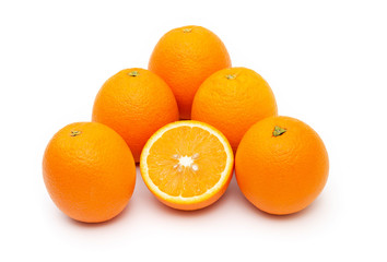 oranges and sliced orange on white background