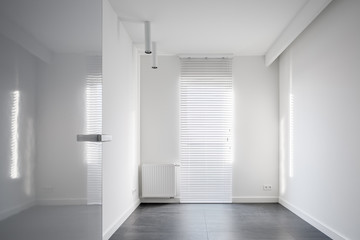 Empty room with window blinds