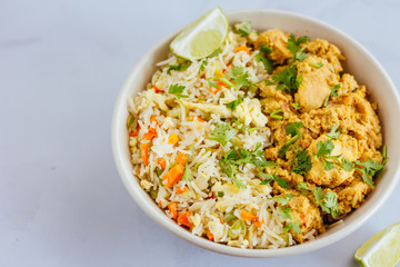 Fried Rice and Chicken Curry in a Bowl - Directly Above Photo. Indian Food, Indian Cuisine, Close Up Photo.