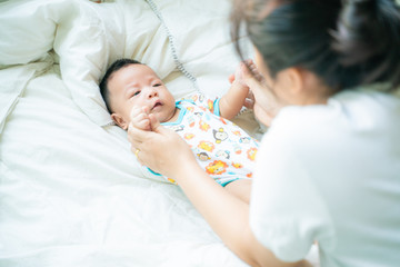 New born baby boy foot massage