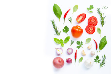 Various fresh vegetables and herbs on white background. Healthy eating concept