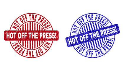 Grunge HOT OFF THE PRESS Exclamation round stamp seals isolated on a white background. Round seals with grunge texture in red and blue colors.