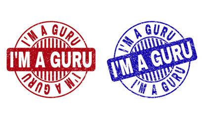 Grunge I M A GURU round stamp seals isolated on a white background. Round seals with grunge texture in red and blue colors. Vector rubber imitation of I M A GURU text inside circle form with stripes.