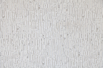 White background with vertical stripes and light gray spots with a texture on wood or paper.