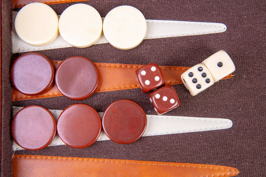 Backgammon Game With Dice And Game Pieces