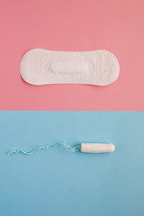 Feminine sanitary pad and tampon on a pink background. The concept of feminine hygiene during menstruation. Flat lay, top view.