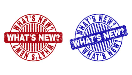 Grunge WHAT S NEW Question round stamp seals isolated on a white background. Round seals with grunge texture in red and blue colors.