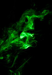 Green smoke on black background