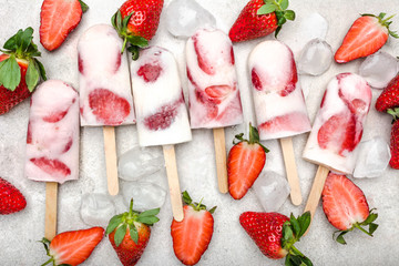Homemade popsicle or strawberry ice cream with yogurt