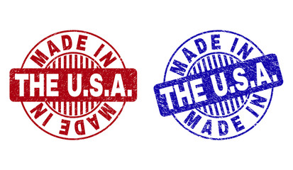 Grunge MADE IN THE U.S.A. round stamp seals isolated on a white background. Round seals with grunge texture in red and blue colors. Vector rubber watermark of MADE IN THE U.S.A.