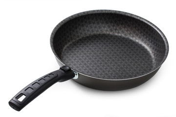 Black frying pan isolated on white background, close-up.