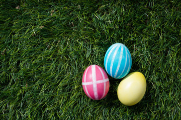 Painted Easter eggs on green grass