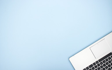 Office supplies on blue background