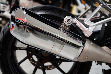 rear wheel of a motorcycle single chrome steel exhaust pipe
