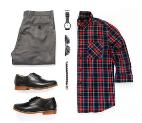 Men's casual outfits for man clothing with office shirt, watch, sunglasses, bracelet, trousers and black shoe isolated on white background, Top view