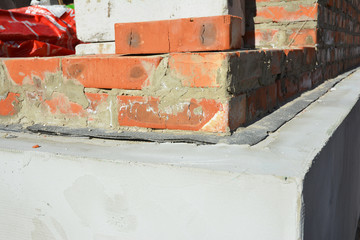 House foundation insulation, plastering, damp proofing, waterproofing.