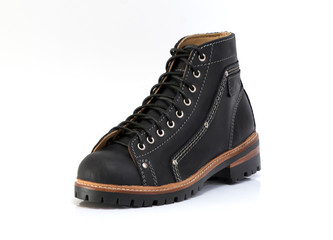 Black boot isolated on white background. Fashion advertising photos.