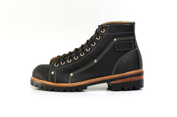 Black boot isolated on white background. Fashion advertising photos.