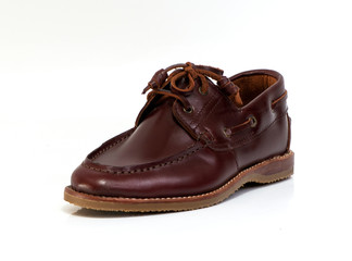 Boat shoe isolated on white background. Fashion advertising shoes photos.