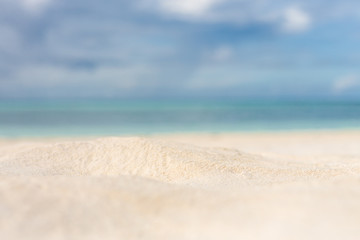 Fototapeta na wymiar White sand background and decoration of sea sky and sun