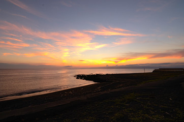 Fototapeta na wymiar a beach in sunset