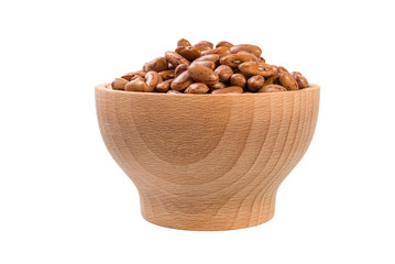 Pinto bean in wooden bowl isolated on white background. nutrition. food ingredient.