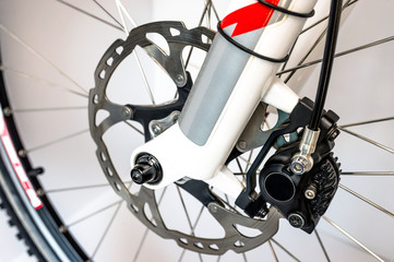  Hydraulic front disc brake on mountain bike. Isolated on a white background. High resolution, full...