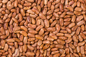 Pinto bean texture background. nutrition. bio. natural food ingredient.