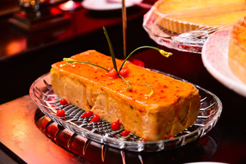 shrimp terrine with syrup and pepper on wooden table, 