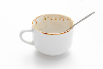 select focus front cup coffee, blank single coffee cup. white glass on white background. Ceramic cup top view