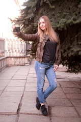 beautiful girl doing self on the street