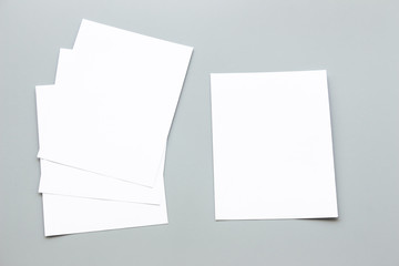 Blank portrait mock-up paper. brochure magazine isolated on gray, changeable background / white paper isolated on gray