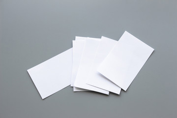 Blank portrait mock-up paper. brochure magazine isolated on gray, changeable background / white paper isolated on gray