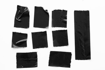 Set of black tapes on white background. Torn horizontal and different size black sticky tape,...