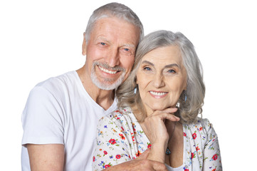 hugging senior couple