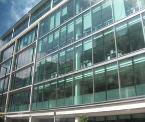 Large windows in the building in sunny weather.