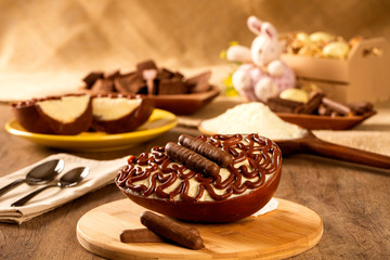 Gourmet easter egg, stuffed with cream and chocolate. Easter egg with pudding cream, Easter...